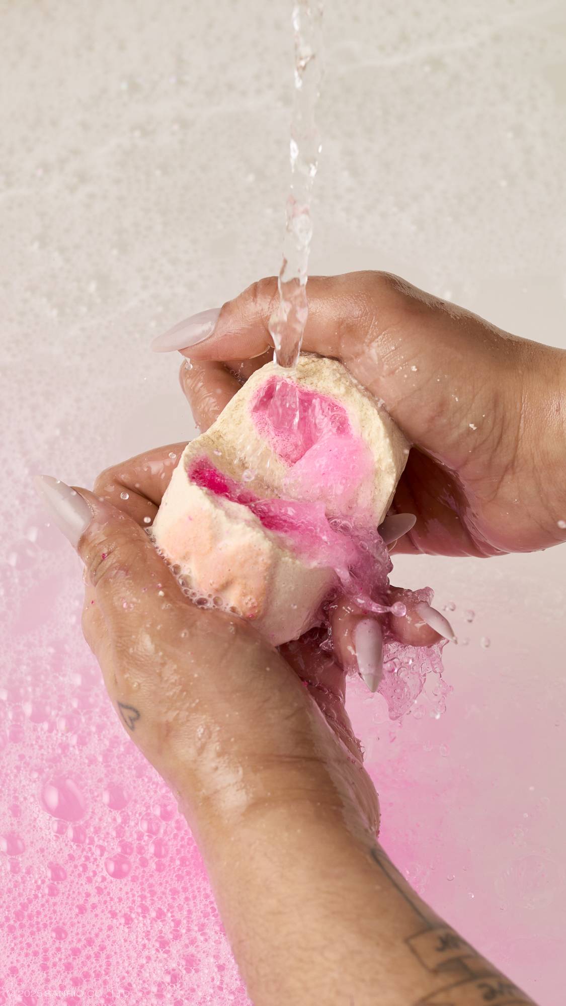 Hands holding a Lush&