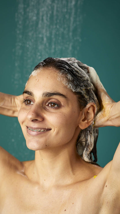 Woman showering and using Lush Lebanon&