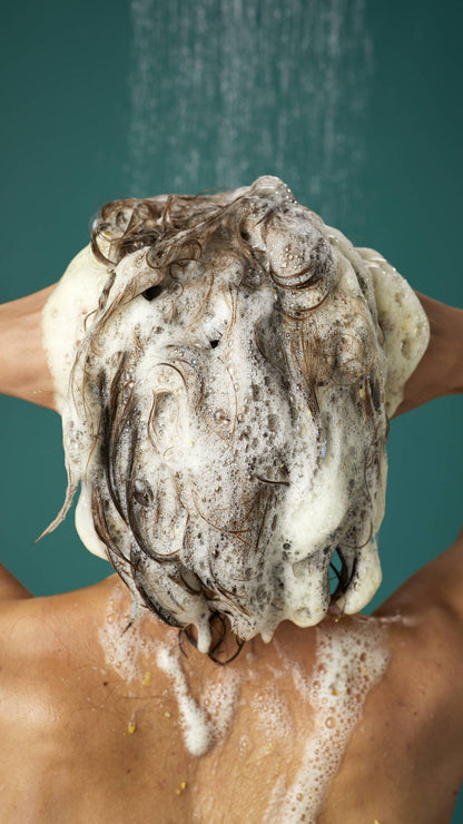 Woman showering and using Lush&