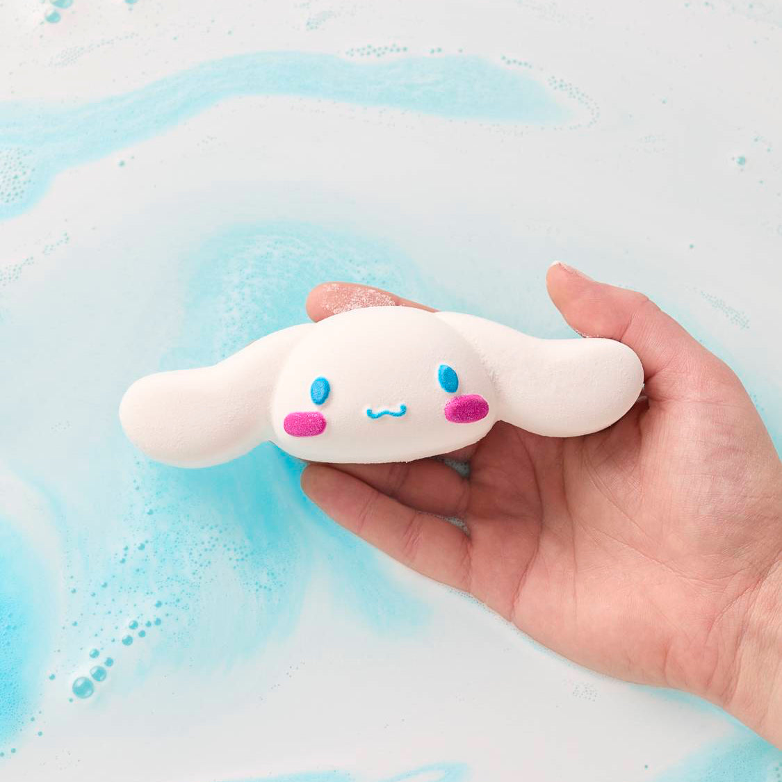 Person holding Lush&