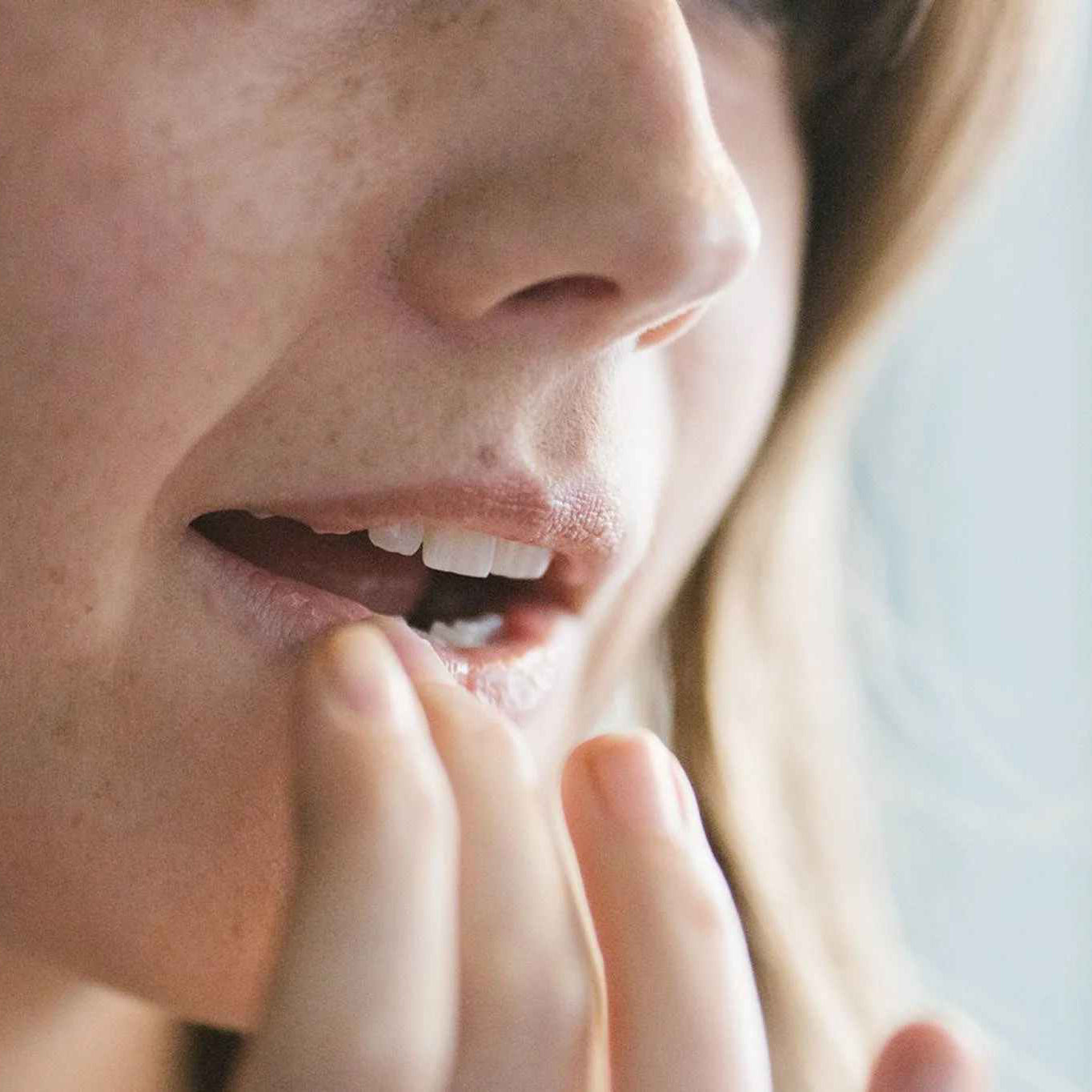 Woman applying Lush&