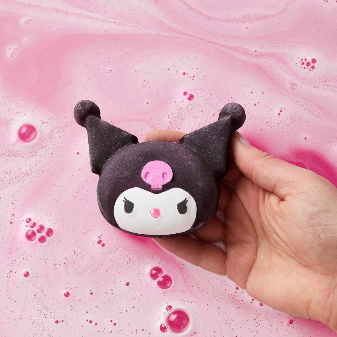 Person holding Lush&