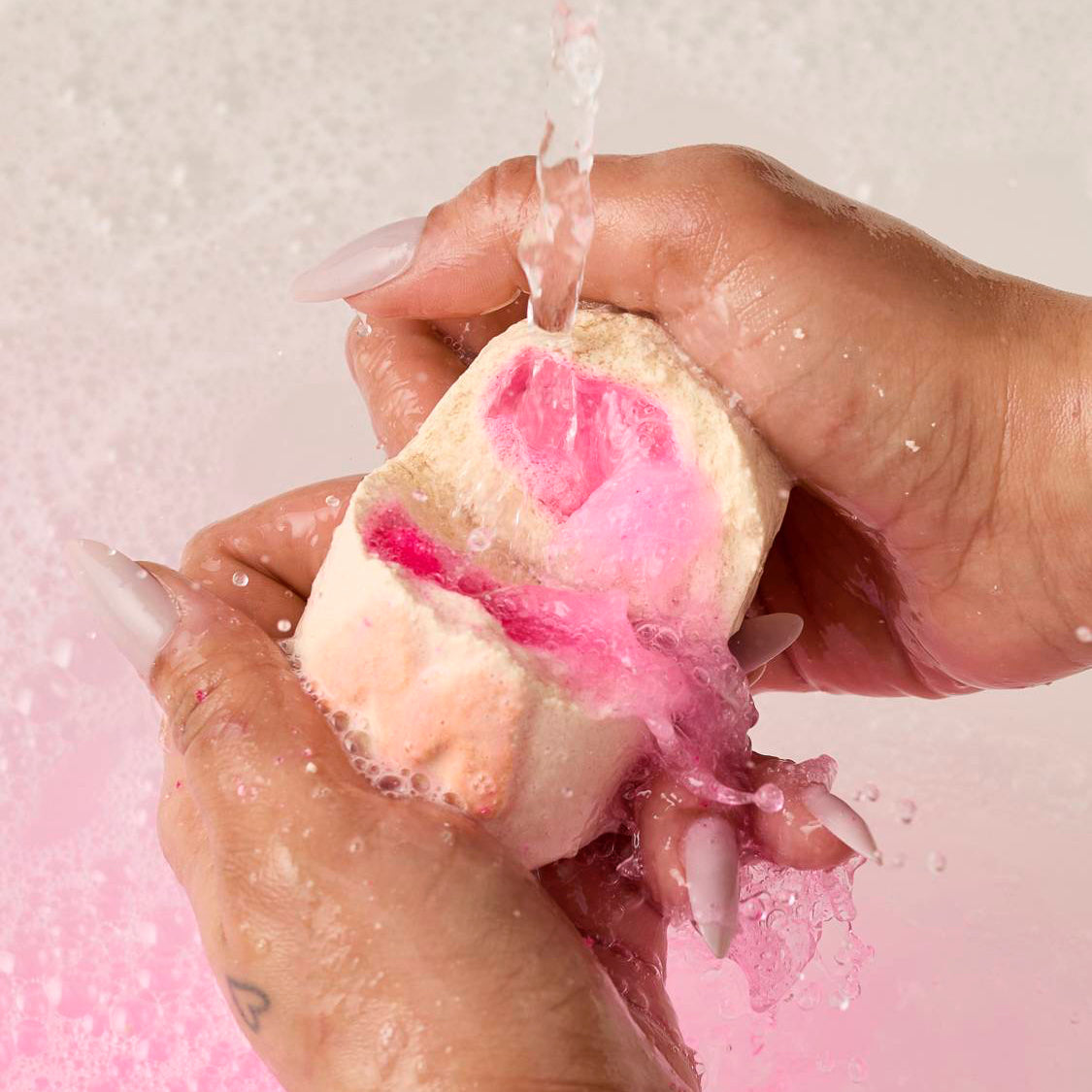 Hands holding a Lush&