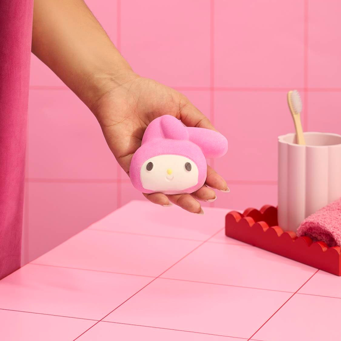 A person holding Lush&