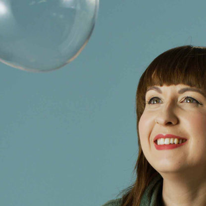 Woman staring at bubble
