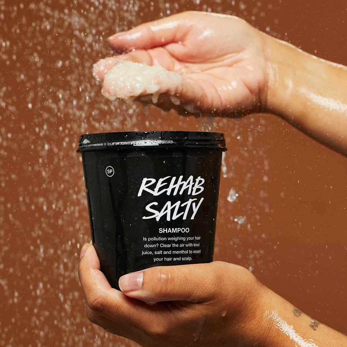 Person holding Lush&