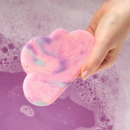 Hands holding two of Lush&