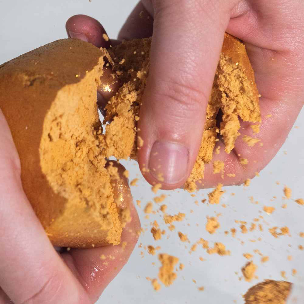Hands crumbling Lush&