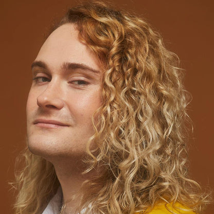 Person posing and showing off their hair