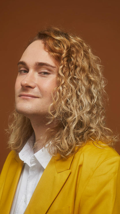 Person posing and showing off their hair